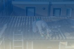 man working on roof background